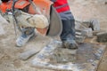 Man worker cutting concrete circular tool diamond blade Royalty Free Stock Photo