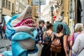 Man, worker, disguised with a giant shark costume advertising for shops in the medieval old town of Prague, a touristic destinatio Royalty Free Stock Photo