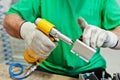 Man worker hold screwdriver machine and use it Royalty Free Stock Photo