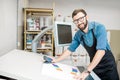 Man working with spectrometer at the manufacturing Royalty Free Stock Photo