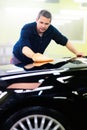 Man worker polishing car Royalty Free Stock Photo