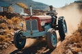 Man worker on red Tractor rides on road in the village, ground view Royalty Free Stock Photo