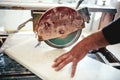man, worker using circular saw for cutting slate and marble Royalty Free Stock Photo