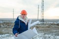 The man worker wear a orange helmet with construction site Royalty Free Stock Photo