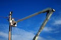 Man Worker Working on Power Lines Crane Bucket High in the Air Dangerous