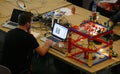 Man working on arduino components project at sonar barcelona