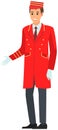 Man working as bellboy. Hotel employee in work clothes. Doorkeeper, doorman, porter in red uniform