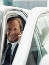 Man Working As Driver Of Limousine Answering Phone Call Royalty Free Stock Photo