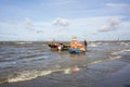 Man working on the beach near Long Hai fish market Royalty Free Stock Photo