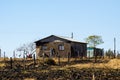 Man working building a mud house, South africa, apartheid, zululand KwaZulu-Natal