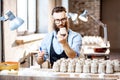 Man working with ceramics at the pottery Royalty Free Stock Photo