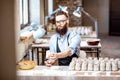 Man working with ceramics at the pottery Royalty Free Stock Photo