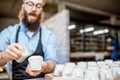 Man working with ceramics at the pottery Royalty Free Stock Photo