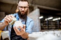 Man working with ceramics at the pottery Royalty Free Stock Photo