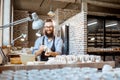 Man working with ceramics at the pottery Royalty Free Stock Photo