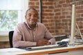 Man Working At Computer In Contemporary Office Royalty Free Stock Photo