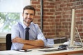 Man Working At Computer In Contemporary Office Royalty Free Stock Photo