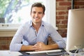 Man Working At Computer In Contemporary Office Royalty Free Stock Photo