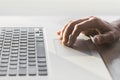 Man working on computer in office. Businessman or student using laptop at home. Royalty Free Stock Photo