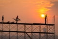 Man working on construction site with scaffold and building with sunset background,scaffolding for construction factory Royalty Free Stock Photo