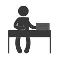 man working desk papers pen writing figure pictogram