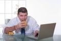Man working and eat unhealt food