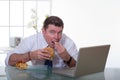 Man working and eat unhealt food