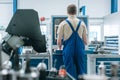 Man working in factory on semi automatized production line Royalty Free Stock Photo