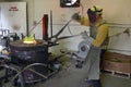 Man Working in the Foundry Hot Furnace