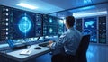 Man Working in Futuristic Data Center with Multiple Monitors Royalty Free Stock Photo
