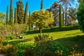 Man Working In Garden Cutting Grass