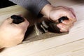Man working with hand jack plane. Old jack plan Royalty Free Stock Photo