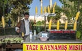 A man working at his corncob stall at Urfa (Sanliurfa) in eastern Turkey.