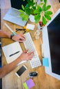 Man working at his desk and typing on keyboard Royalty Free Stock Photo