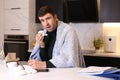 Man working from home with a cold Royalty Free Stock Photo