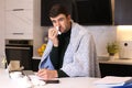 Man working from home with a cold Royalty Free Stock Photo