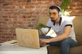 Man working from home during coronavirus or COVID-19 quarantine, remote office concept Royalty Free Stock Photo