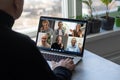 Man Working From Home Having Online Group Videoconference On Laptop. Royalty Free Stock Photo