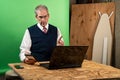 Man working from home in his basement on a virutal meeting Royalty Free Stock Photo