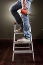 Man working on ladder Royalty Free Stock Photo