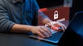 Man working on laptop with access denied error message on screen computer Royalty Free Stock Photo