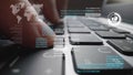 Man working on laptop computer keyboard with graphic user interface GUI hologram
