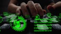 Man working on laptop computer keyboard with graphic user interface GUI hologram Royalty Free Stock Photo
