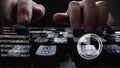 Man working on laptop computer keyboard with graphic user interface GUI hologram Royalty Free Stock Photo