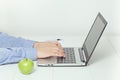 Man working on laptop. healthy eating at office. Royalty Free Stock Photo