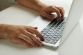 A man working on a laptop, his hands close up Royalty Free Stock Photo