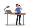 A male programmer works with digital technologies and drinks lemonade in the kitchen