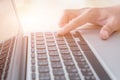 Man working with laptop, man`s hands on notebook computer, business person at workplace Royalty Free Stock Photo