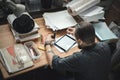 A man working on blueprints in office Royalty Free Stock Photo