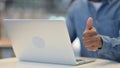 Man Working on Laptop and Showing Thumbs Up Sign, Close Up Royalty Free Stock Photo